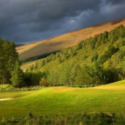 The 13th green under glowering skies, Macdonald Cardrona Hotel & Golf Spa 